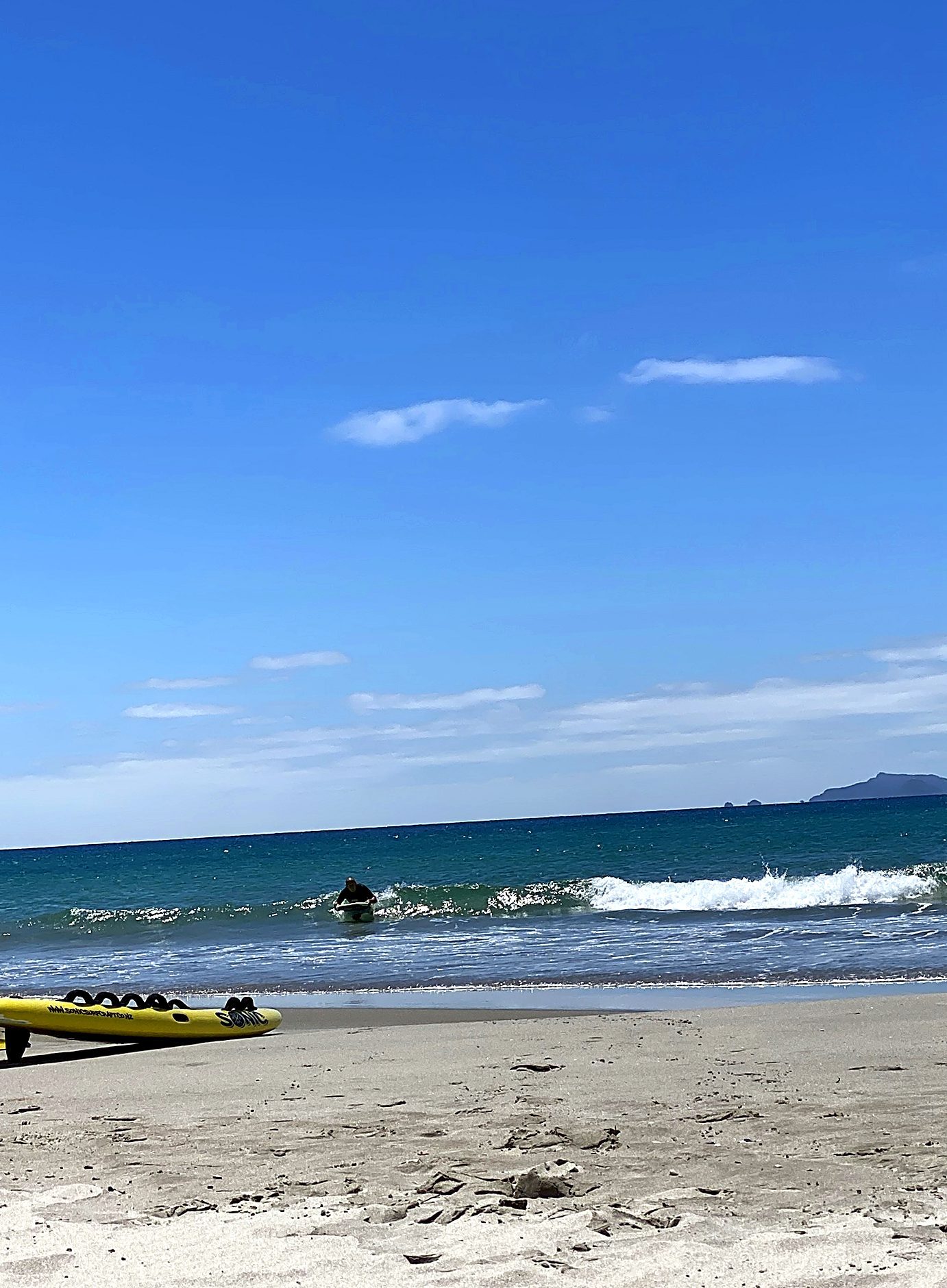 Kayak resting at the shoreline before an estuary paddle
