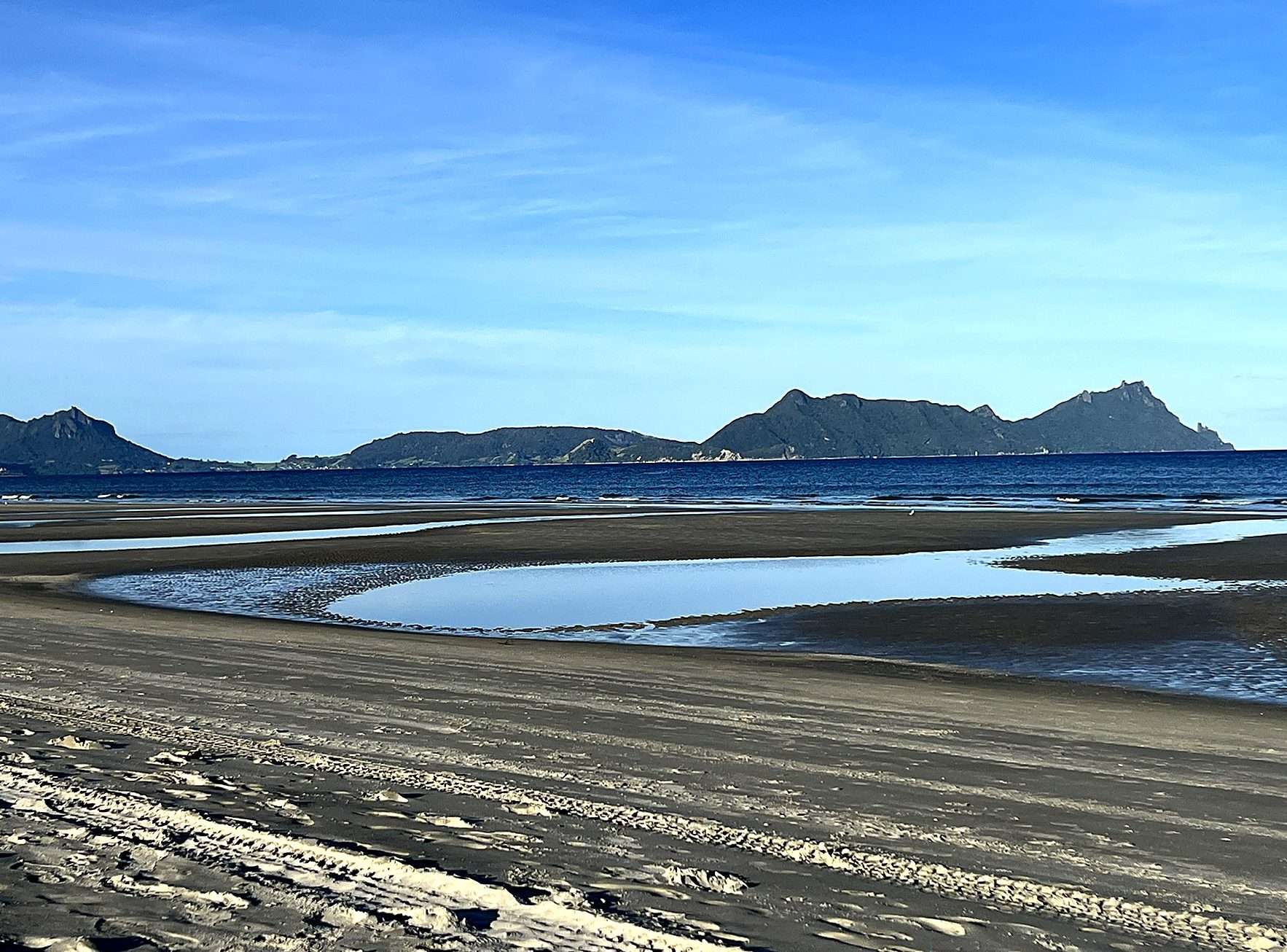 Bream Bay panorama towards the volcanic peaks of the Whangārei Heads